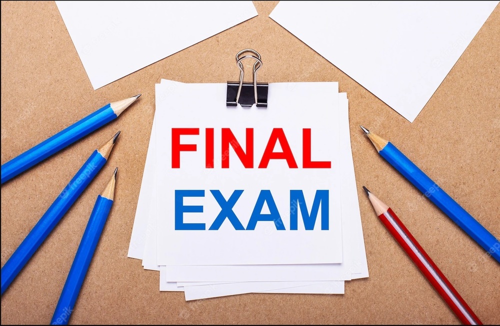 Image of pencils and a note pad with the text "Final Exam" 